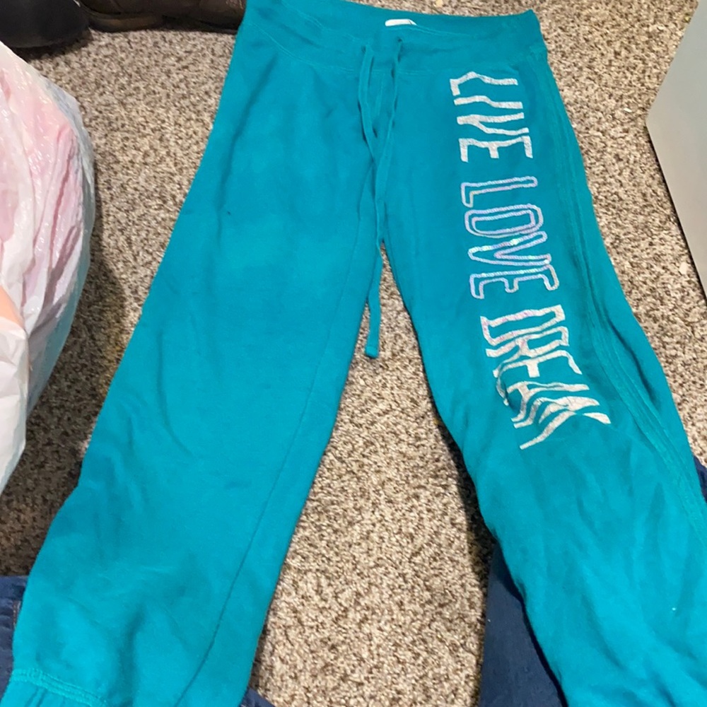 Live love dream, size XS and color is teal, silver